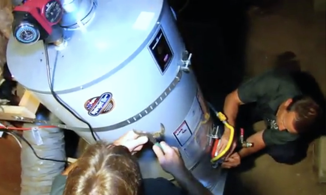 Mason technicians working on a water heater